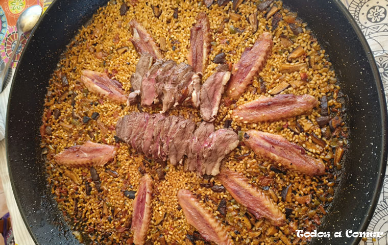 Arroz de pato con un toque de naranja